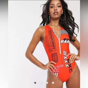 ASOS DESIGN high neck zip front swimsuit in sporty print